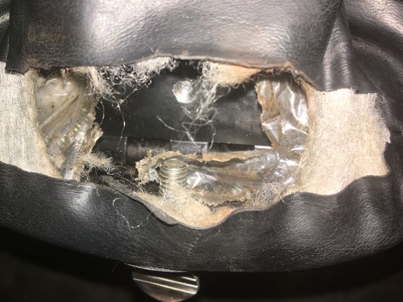 Drilled and tapped....put a thumbscrew there. Screw in and the backrest is leaned in towards the rider. I’ve had this backrest for 10 years....should’ve done this years ago🤔