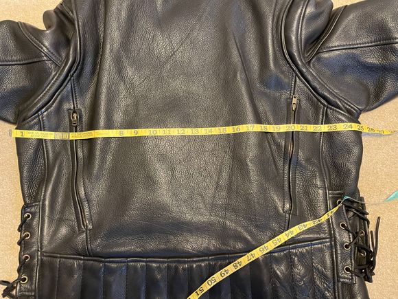 Lying flat across back 25”