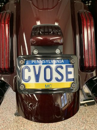 H-D black curved license plate frame on modified stock tail light 