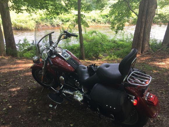 Willimantic river in Tolland Ct.  Let’s stick with the transportation theme and see your bike at a train station or at least a marked railroad crossing 