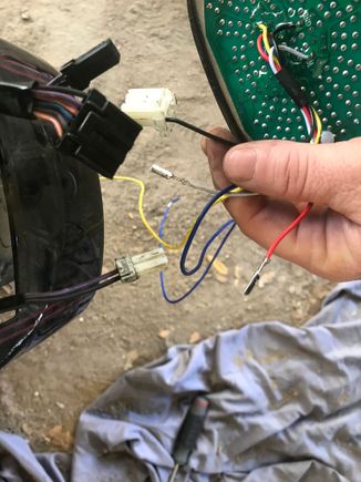 New light. Red is brake light. Blue is left turn. Yellow is right turn. White is running. Black is negative. 