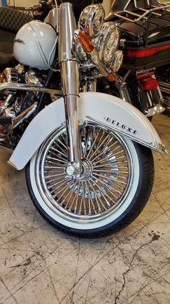 Went 18" x 3.5" tire is a continental as it was hard finding whitewalls in my choice of size. Chromed the lower forks and sliver braided all the wires i could. Hard to find chrome stuff to fit the 2017 forward deluxes.