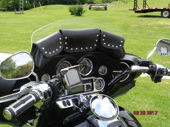 If you lift the fuel tank the convex bend helps clear the tank