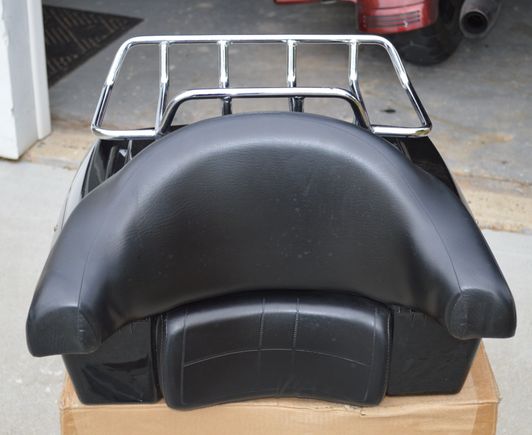 no holes or tears in seat that i see.. had small wrinkle on center bottom backrest i believe will press out with use.. was sitting in box..