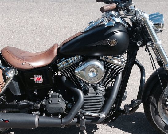 Knight footpeg lowering mounts, 1”,  seat re-contouring by competent seat maker, aftermarket re-curve windshield in HD mounts.
30 states and 6 provinces later, I’ve tried many FLH’s and am keeping my Fat Bob