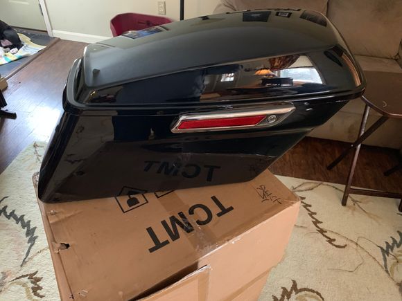 TCMT Vivid Black 2014+ Right saddlebag with lock and keys. 

$135 Shipped. 