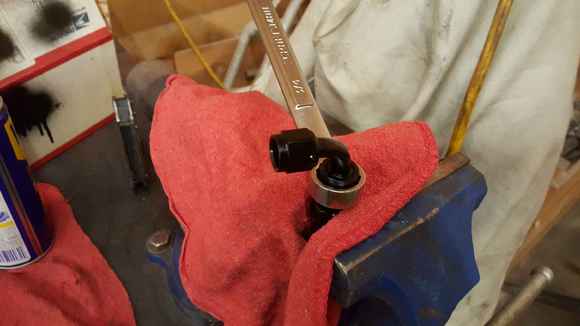 Hold stationary hose nut - while tightening hose end into hose nut - spray WD40 onto hose end..., to help it seat into hose / hose end