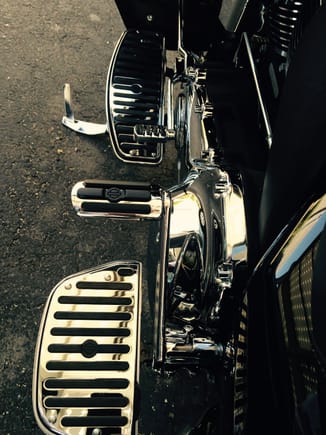 H-D Chrome & Rubber, with adjustable second position passenger pegs. (Happy wife, happy life.)
