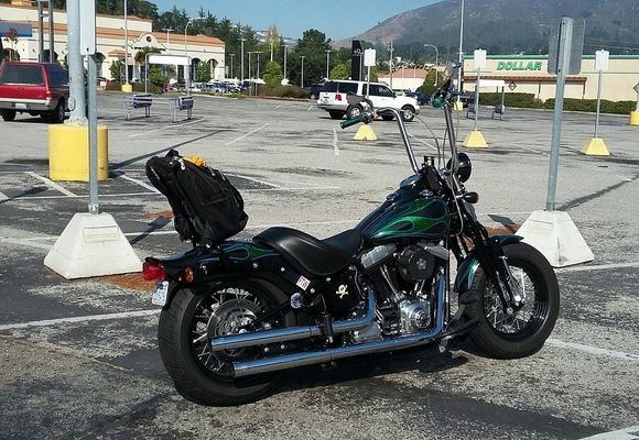 Put a sissybar and a bag! Damn it's great to be able to bring stuff with me on rides! One thing I missed from my Street Glide.