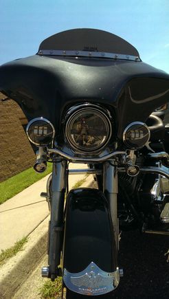 Here's my LED headlight set up.  Headlight is a Truck Lite Phase 7 (http://www.ebay.com/itm/142399579000 buy it here for $70!!!!!) Passing lights are cree. Those ran me $40 on eBay as well.  Say the exact set at shop for $150.  The phase 7 is normally $200-250.