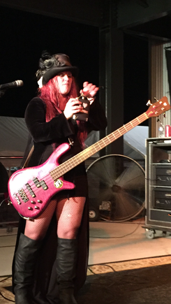 Jasmine Cain taking a hoot from my flask