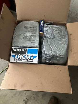 All packed. Pistons, rings, and hardware.