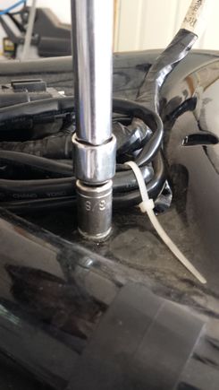 unbolting the 3 or 4 bolts holding the oil tank to the frame
