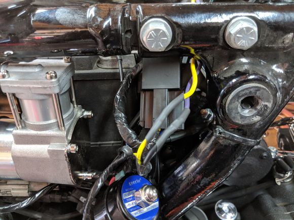 After the switch harness was ran under the tank, I soldered the wires to the dump valve and compressor relay