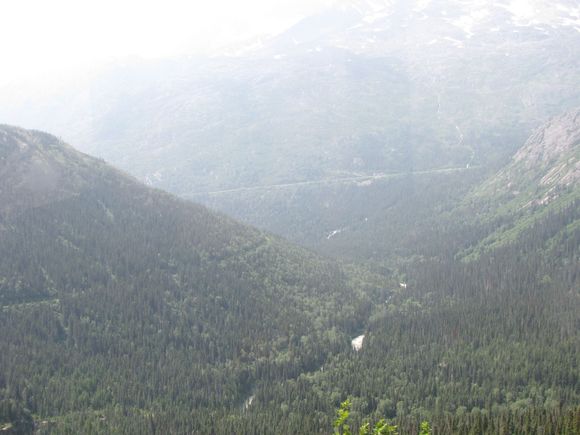 You can see the train tracks cut into the mountain.
