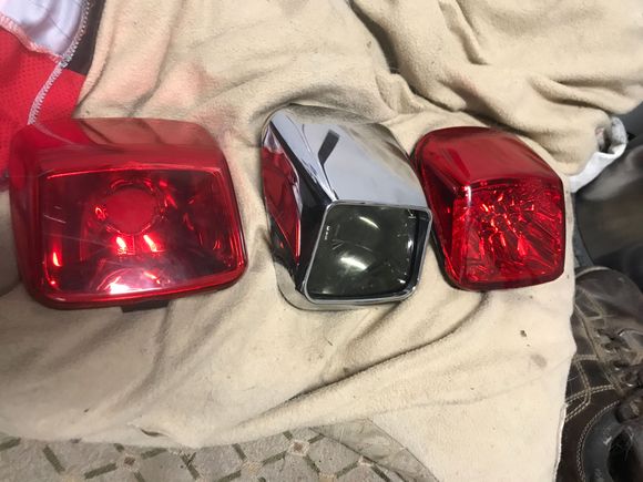 Tailights L - R Stock 30 shipped
Middle smoked with hard to find Chrome cover
Smoked lens does have some scuffs on it, hence the reason I bought the cover for it.  Cover can be easily moved to a different light. 45 Shipped 
LED HD I have better detailed pic in other pics, but this one is 55 shipped
