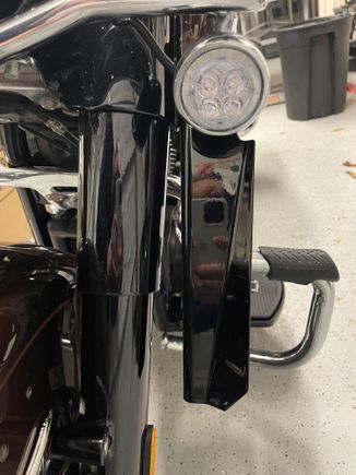 Mounted inside the spool. 