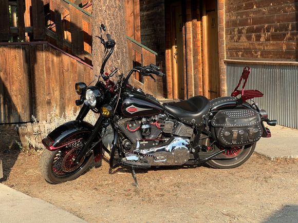 Rear tire has a reflective strip that looks like a thin whitewall, it was something I decided to try out but didn’t care for in the end. The front is a regular blackwall because they didn’t make the reflective style in a 18” wheel size. but same SR777HD other than that.

Next set will both be blackwalls.