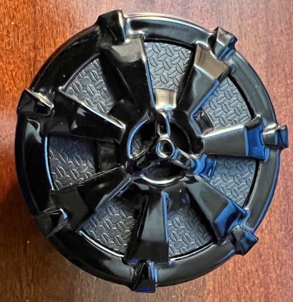 This is the top of the aftermarket cap.
