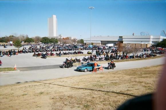 End of run...This was one of 2 lots to park. The other was up the hill behind this one. So when you look at the other pics there are much more in the far distance. An estimated 4K bikes.