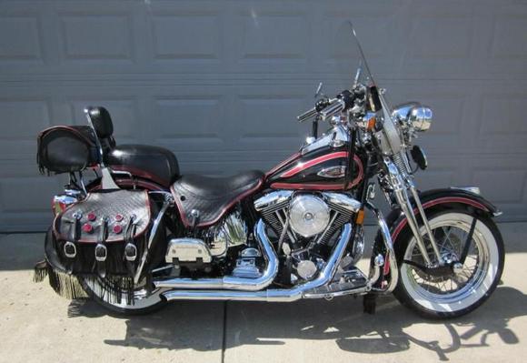 My 1998 FLSTS. We had to sell it in order to be able to sell our house. This is the motorcycle that gave me Harley fever.