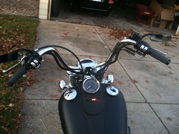 Renthal Grips; Black low profile oval mirrors; Chrome switch/buttons