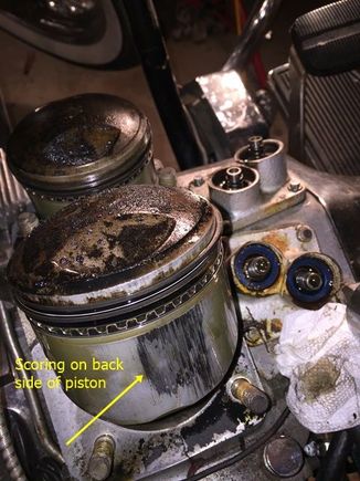 Some rear scoring on backside of rear piston