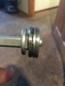 see all the way to left, the shaft and what looks like a washer, well thats part of shaft I had one guy said it all comes off, and another said no?