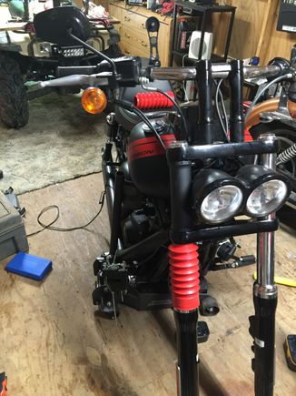 I busted a fork seal about midway through July last year. Added black upper fork tube covers and red gaiters. Also Ricor Intiminators