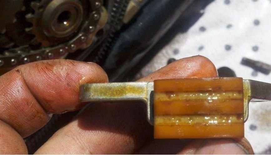 HDFORUM USER.  Roller chain at 90K. You can see the roller touching.  Wear practical stops then in this USERs opinion. 