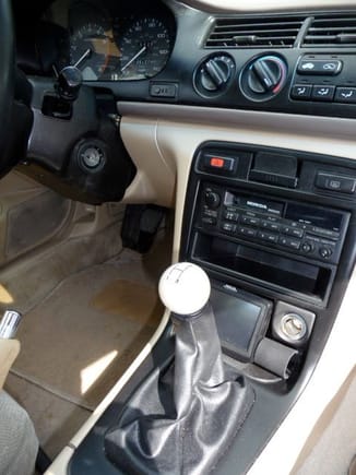 antique shift knob, GPS and radar detector (where rear defroster switch was)