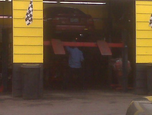 Up on the lift getting the exhaust welded on