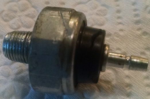 Unknown sensor with broken piece reattached.
