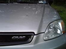 The grill has been painted, and someone jacked the civic emblem while i was at work. a-holes.