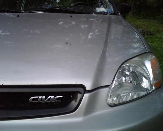 The grill has been painted, and someone jacked the civic emblem while i was at work. a-holes.