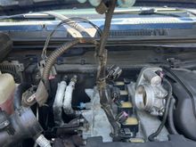 Ignition harness. The larger grey connector towards the firewall on left looked a bit rough, locking clamps broke off. The small black connector also looked a bit rough 