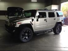 Hummer H2 in shop after wheel &amp; tire install