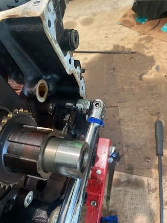 Timing Chain Tensioner Bolts - I used a breaker bar.  They were pretty tight, enough that an impact driver couldn't loosen them.  