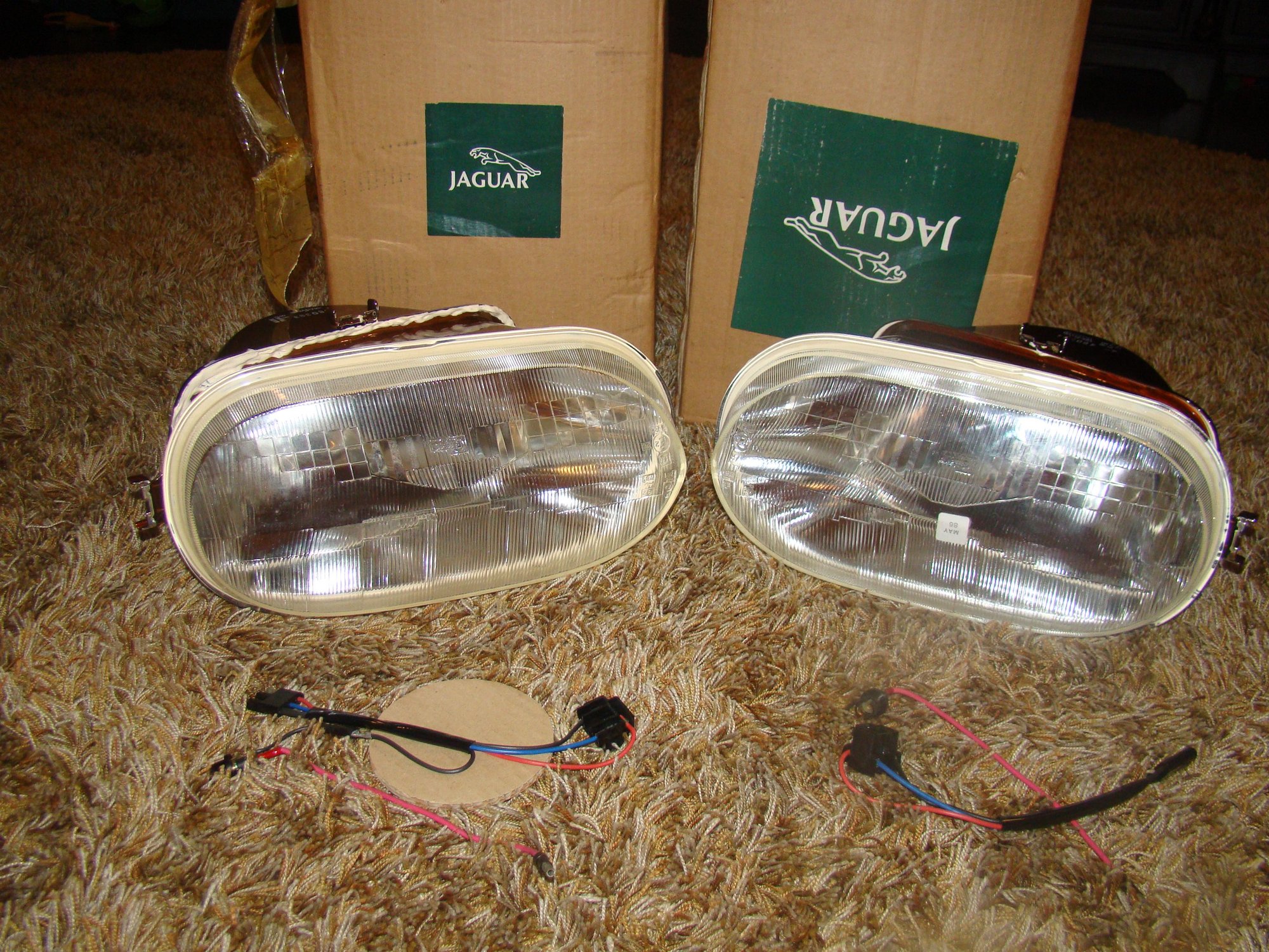 New in original box OEM Jaguar XJS headlight assembly PAIR Jaguar