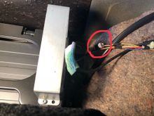 Anyone know what this un-used plug near the CD changer is? Be really cool if it was an audio out I could use. 