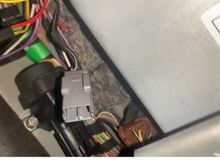 This plug near inertia switch, unplugged, can’t see any place to plug it in, may be spare one