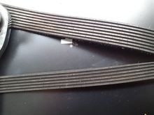Factory belts after same mileage.