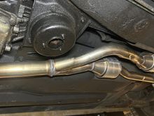 From under the left front