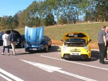 Car show. Bonnet in maintenance position