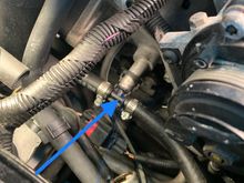 Breather hose connection at throttle body. 