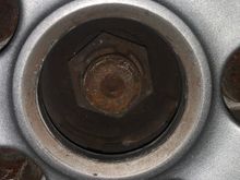 Thats the rear wheel bolts, the front wheels are just blank with no bolt?