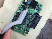 Stiff nylon bristle brush to remove tracking