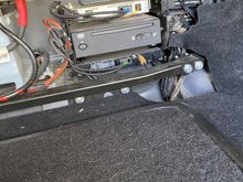 Rear with navigation dvd and subwoofer box in spare wheel well
