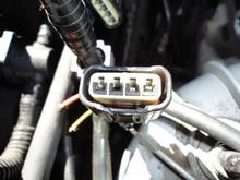 Be careful not to break the coil connectors that plug into each coil.