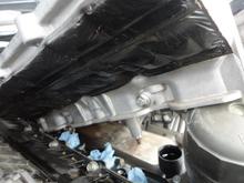 The alignment pin at the bottom of each manifold to the block and the bolt at the bottom of the manifold that connects to the supercharger  is also seen in this photo.